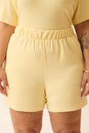 SHORT COM BOLSO MODAL GENEBRA AMARELO MANTEIGA